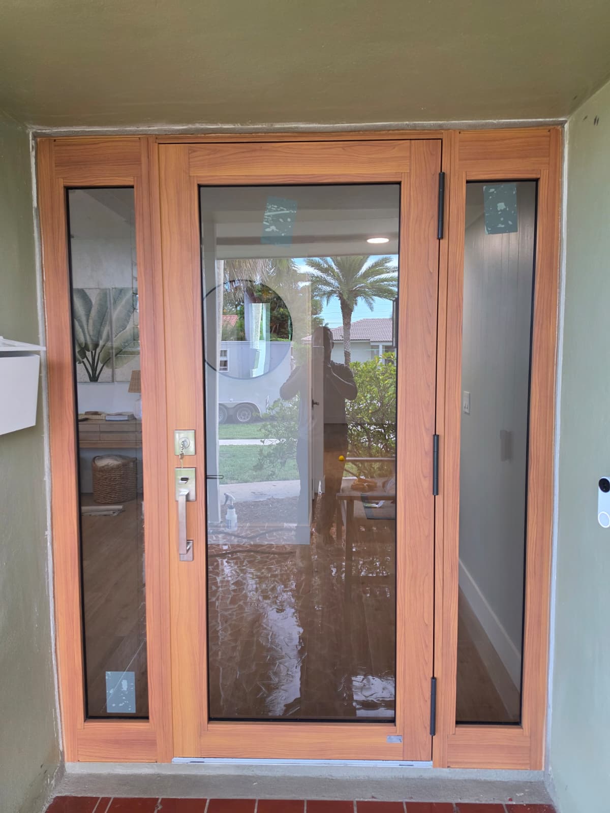 Custom wood pivot entry door with sidelites South Florida